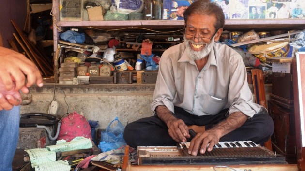 3 - We finally locate Waheed Music shop and find Waheed repairing a harmonium there