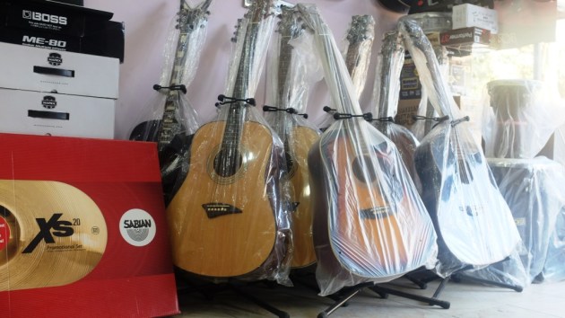 4 - Assortment of imported guitars on display