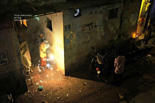 15-a-kid-lights-up-sparkles-in-front-of-his-house-in-narayanpura