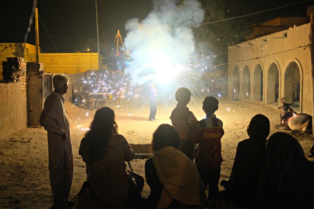 18-the-little-daredevil-lights-up-a-basic-firework-in-his-hand