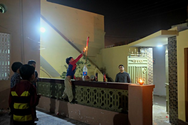 24-a-kid-lights-up-a-flare-on-diwali