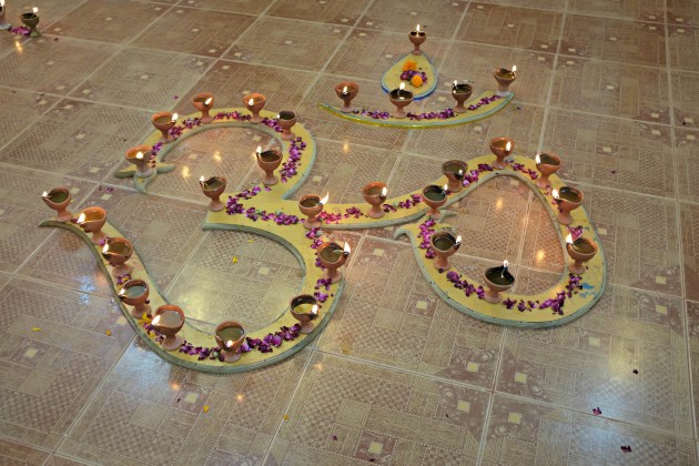5-om-symbol-displayed-inside-krishna-temple-for-diwali
