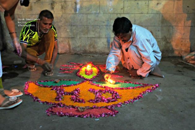 6-people-make-rangoli-with-petals